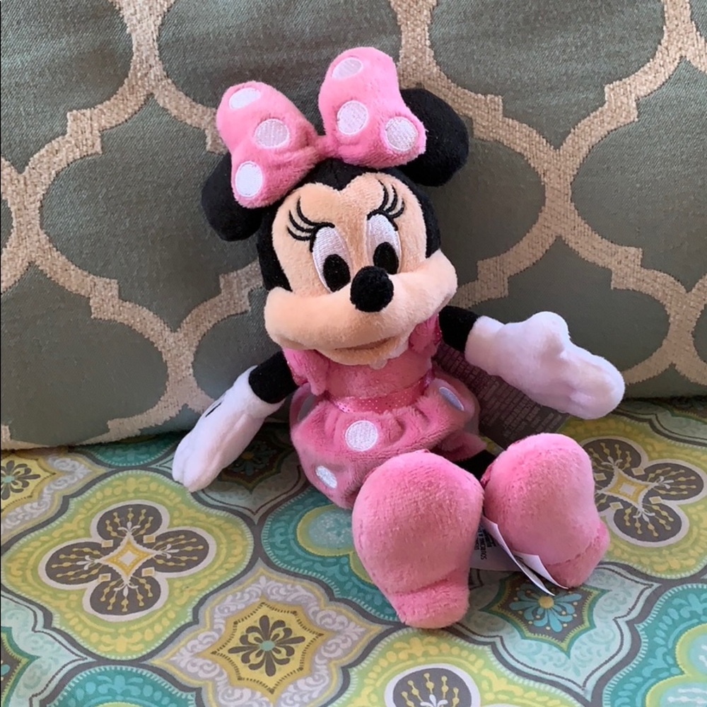 Disney Minnie Mouse plush in pink dress